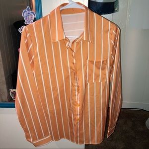 Peach and white striped blouse